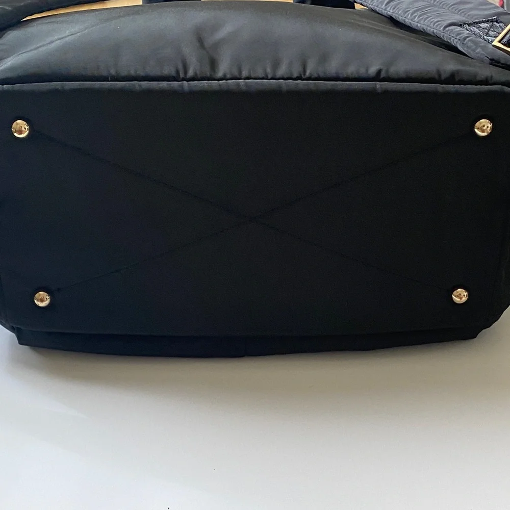 Skip Hop Black Quilted Multifunctional Backpack with Tan and gold accents